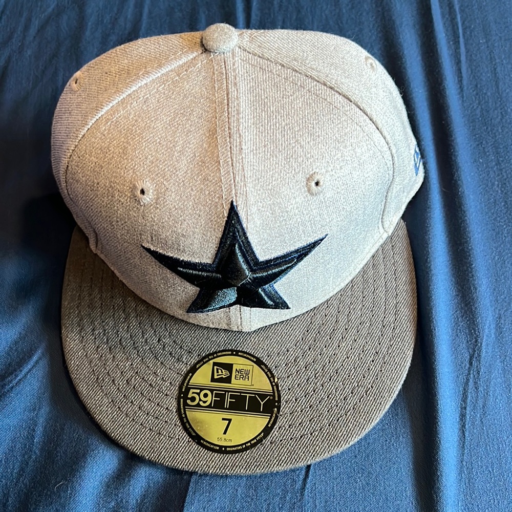 Used Dallas Cowboys Fitted Hat. Size 7.